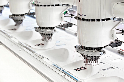 CapSmill custom caps factory banner